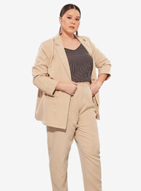 A woman dressed in Latte Oversized Blazer