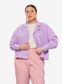 A woman dressed in Lilac Cropped Shirt