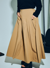 A woman wearing Latte Harper Poplin Skirt