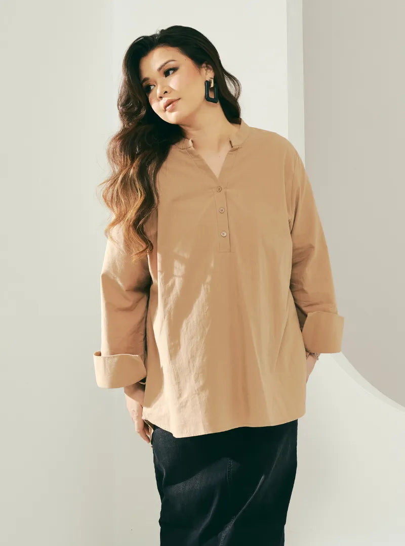 A woman dressed in Latte Jasper Mandarin Collar Basic Shirt