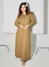 A woman dressed in Latte Marsya Cotton Long Sleeve Dress