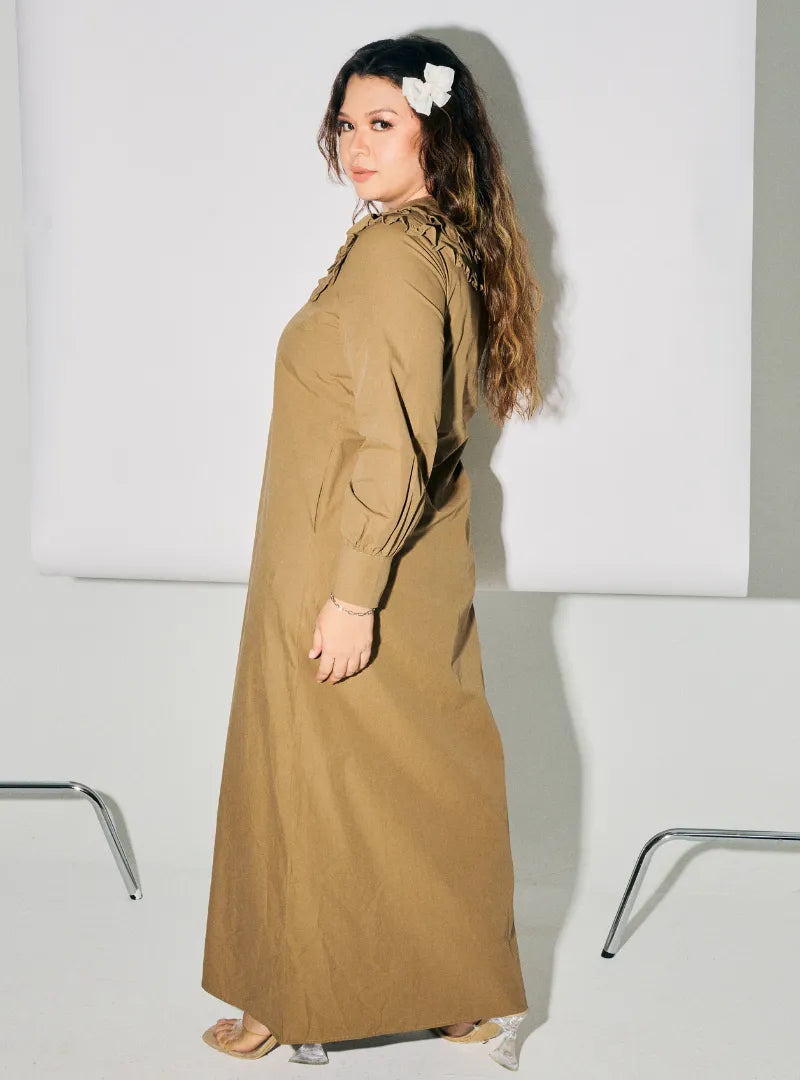 A woman dressed in Latte Marsya Cotton Long Sleeve Dress