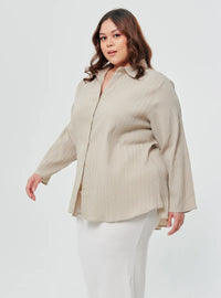 A woman dressed in Latte Textured Shirt