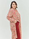 A woman dressed in Leopard Red Longline Printed Shirt Dress