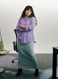 A woman dressed in Lilac Miyo Mandarin Collar Striped Polo Shirt