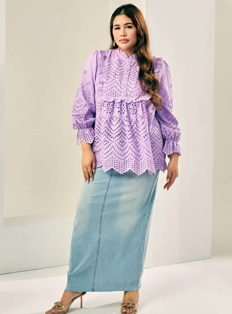 A woman dressed in Lilac Ezzah Eyelet Doll Top