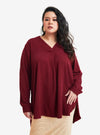 A woman dressed in Maroon Mandarin Collar Oversized Shirt