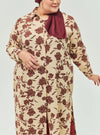 A woman dressed in Marooon Chrysanthemum Longline Printed Shirt Dress