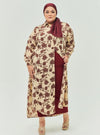 A woman dressed in Marooon Chrysanthemum Longline Printed Shirt Dress