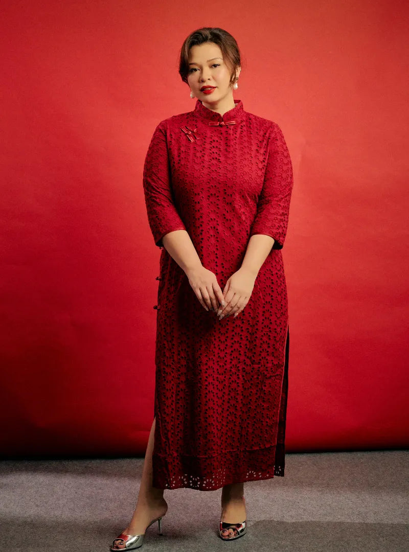 A woman dressed in Maroon Mi Gu Eyelet Cheongsam Dress