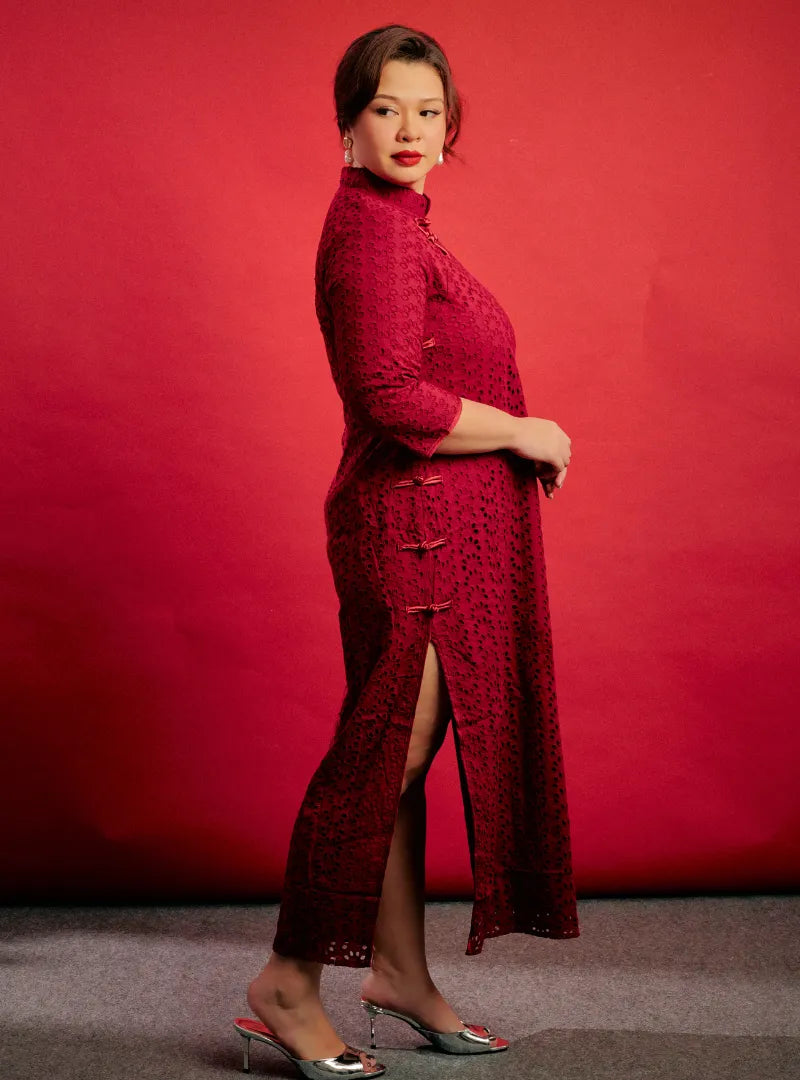 A woman dressed in Maroon Mi Gu Eyelet Cheongsam Dress