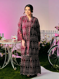 A woman dressed in Maroon Tun Farah Embroidered Eyelet Kurung