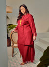 A woman dressed Maroon Tun Melur Dotted Kurung Pahang-