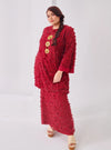 A woman dressed in Maroon Tun Sharifah Lace Kurung