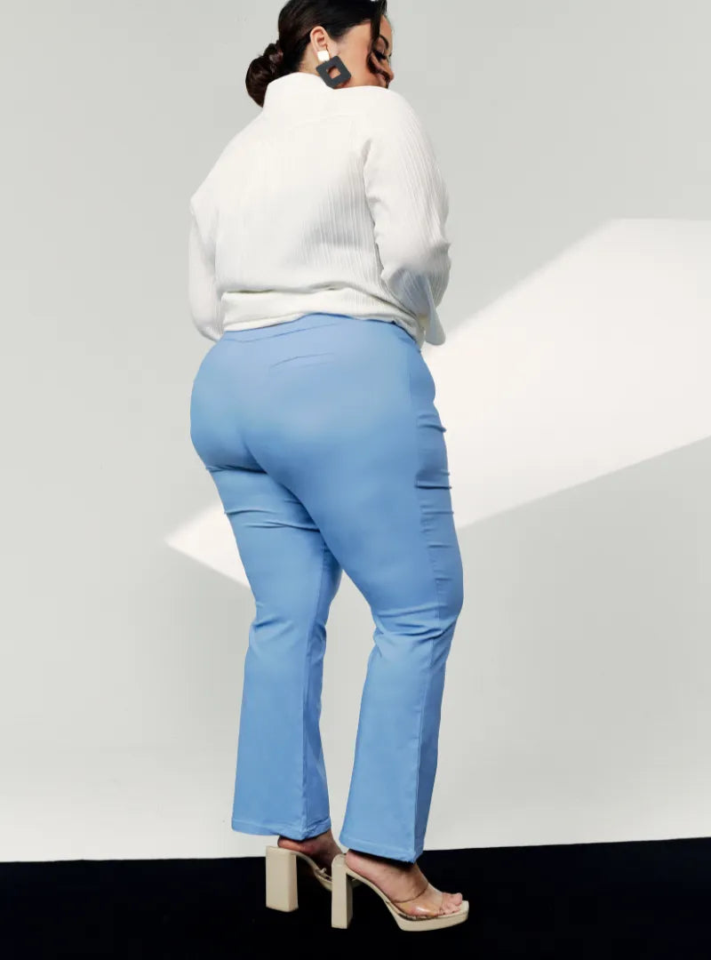A woman wearing Mid Blue Ms Nadia Bootcut Trouser
