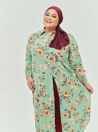 A woman dressed in Mint Flower Longline Printed Shirt Dress