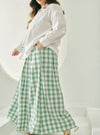 A woman wearing Mint Green Jane Checked Skirt