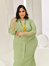 A woman dressed in Mint Green Tun Jamilah Pletated Kebarung