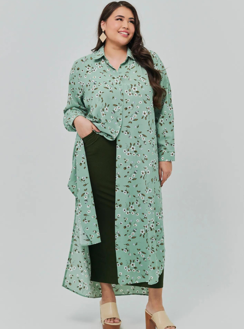 A woman dressed in Mint Jasmine Longline Printed Shirt Dress