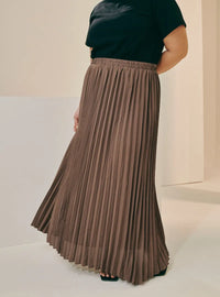 A woman wearing Mocha Basic Pleated Skirt