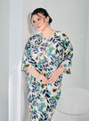 A woman dressed in Navy Dedaun Essential Front Knot Printed Light Cotton Dress