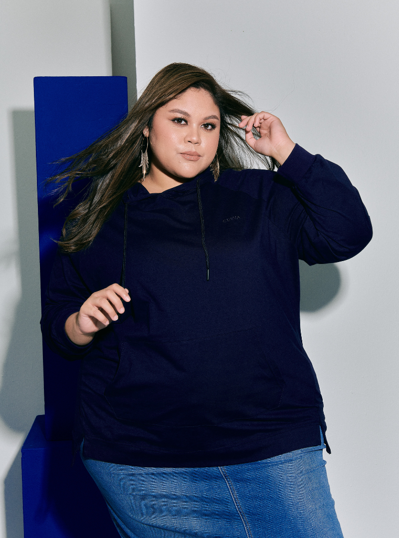 A woman wearing Navy Jackson Embroidered Hoodie