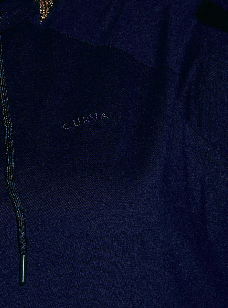 A woman wearing Navy Jackson Embroidered Hoodie