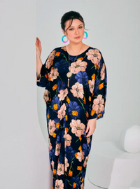 A woman dressed in Navy Nude Fleur Essential Front Knot Kaftan