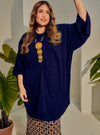 A woman dressed in Navy Tun Bedah Top