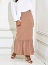 A woman wearing Nude Ms Leia Ruffles Skirt