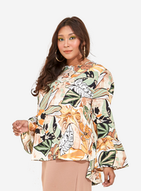 A woman dressed in Nude Pisang Tropical Top