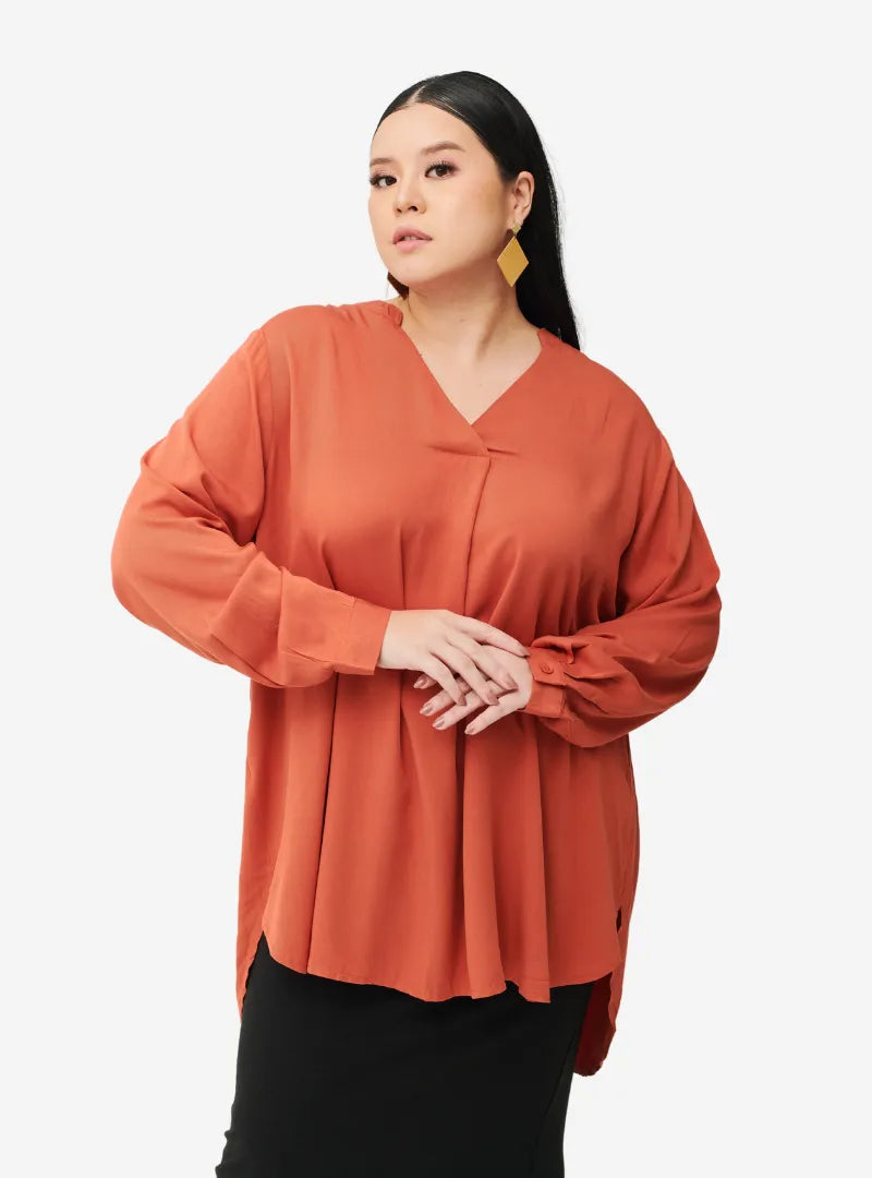 A woman dressed in Orange Mandarin Collar Oversized Shirt