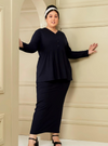 A woman dressed in Navy Peplum Button Front Knit Top