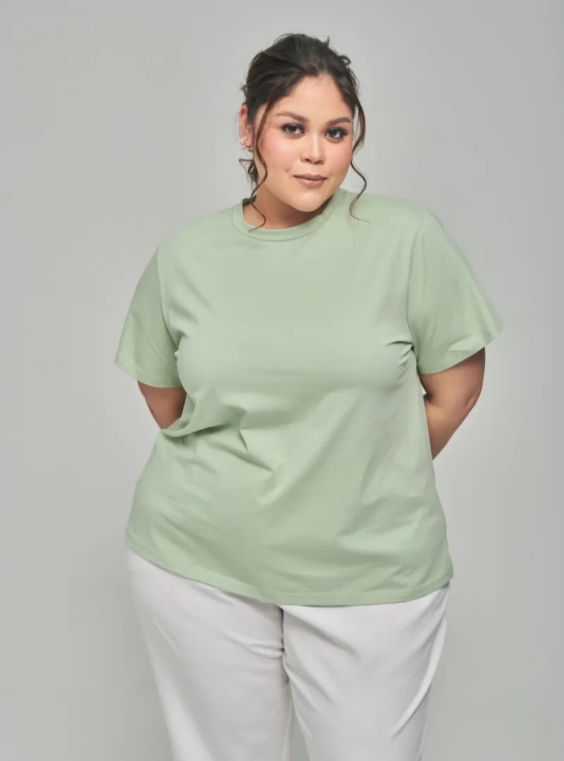 A woman dressed in Pistachio Basic Cotton Tee