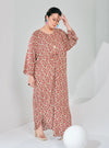 A woman dressed in Peach Nude Essential Front Knot Kaftan