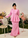 A woman dressed in Pink Doll Tun Zera Eyelet Kurung