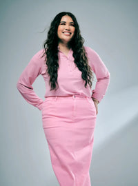 A woman wearing in Pink Doll Zalia Denim Long Skirt