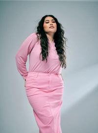 A woman wearing in Pink Doll Zalia Denim Long Skirt