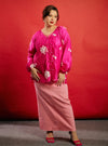 A woman dressed in Pink Goddess Wong Gu Embroidered Cheongsam Top