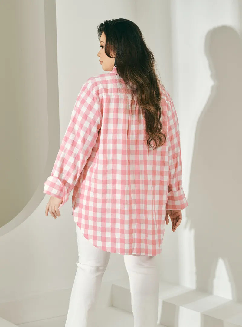 A woman dressed in Pink Jennie Oversized Checked Cotton Shirts