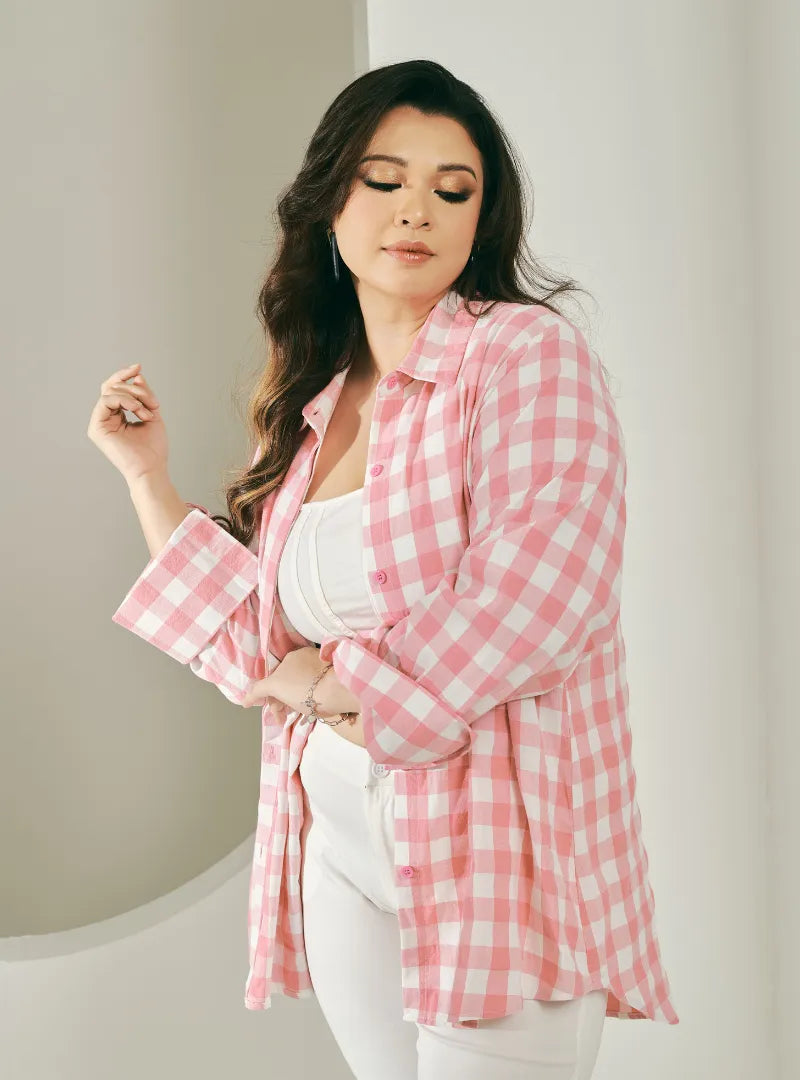 A woman dressed in Pink Jennie Oversized Checked Cotton Shirts