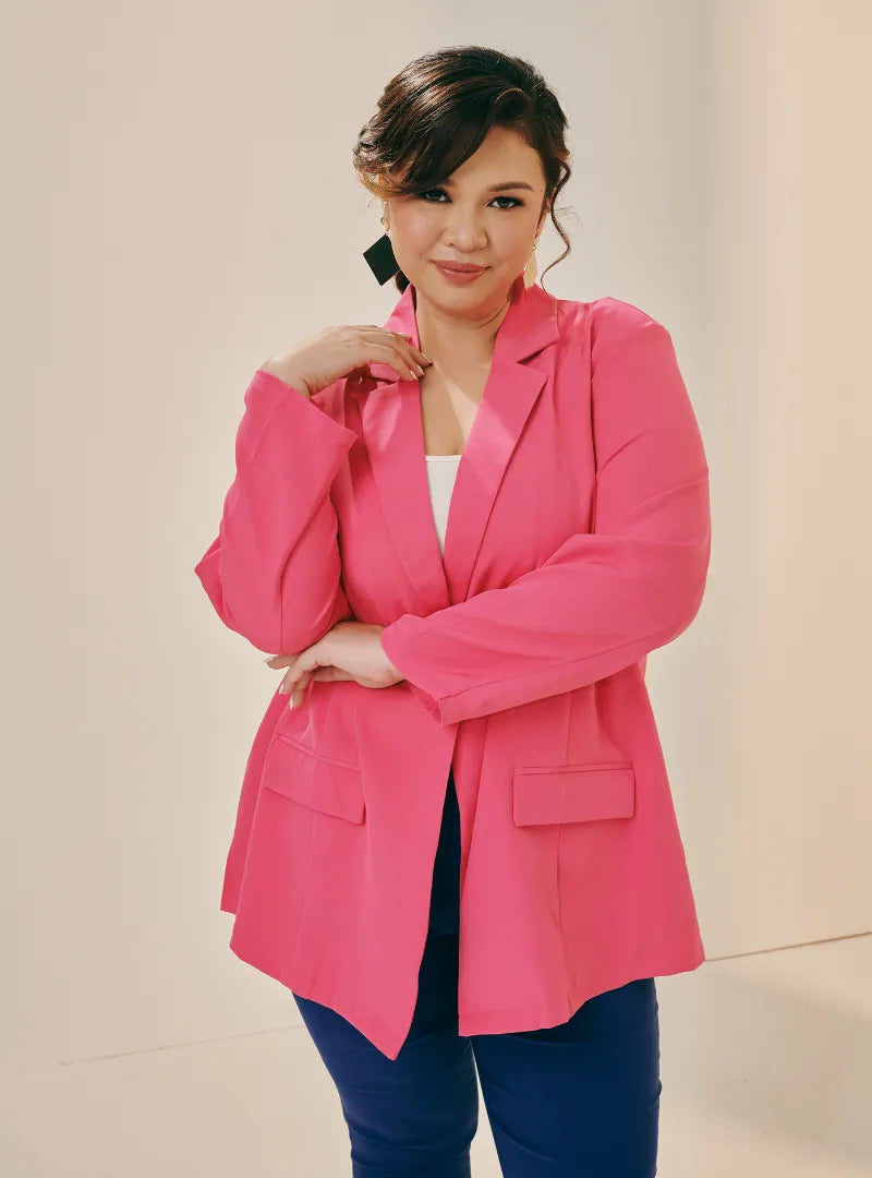 A woman dressed in Pink Stunner Lapel Collar Oversized Blazer