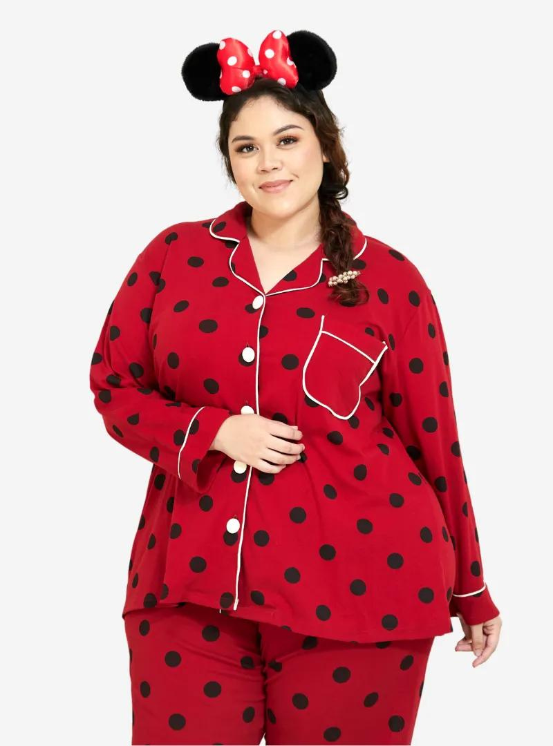 A woman dressed in Sexy Red Polka Dotted Pyjamas