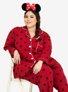 A woman dressed in Sexy Red Polka Dotted Pyjamas