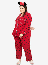 A woman dressed in Sexy Red Polka Dotted Pyjamas