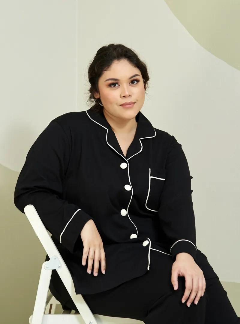 A woman dressed in Black Premium Cotton Pyjamas