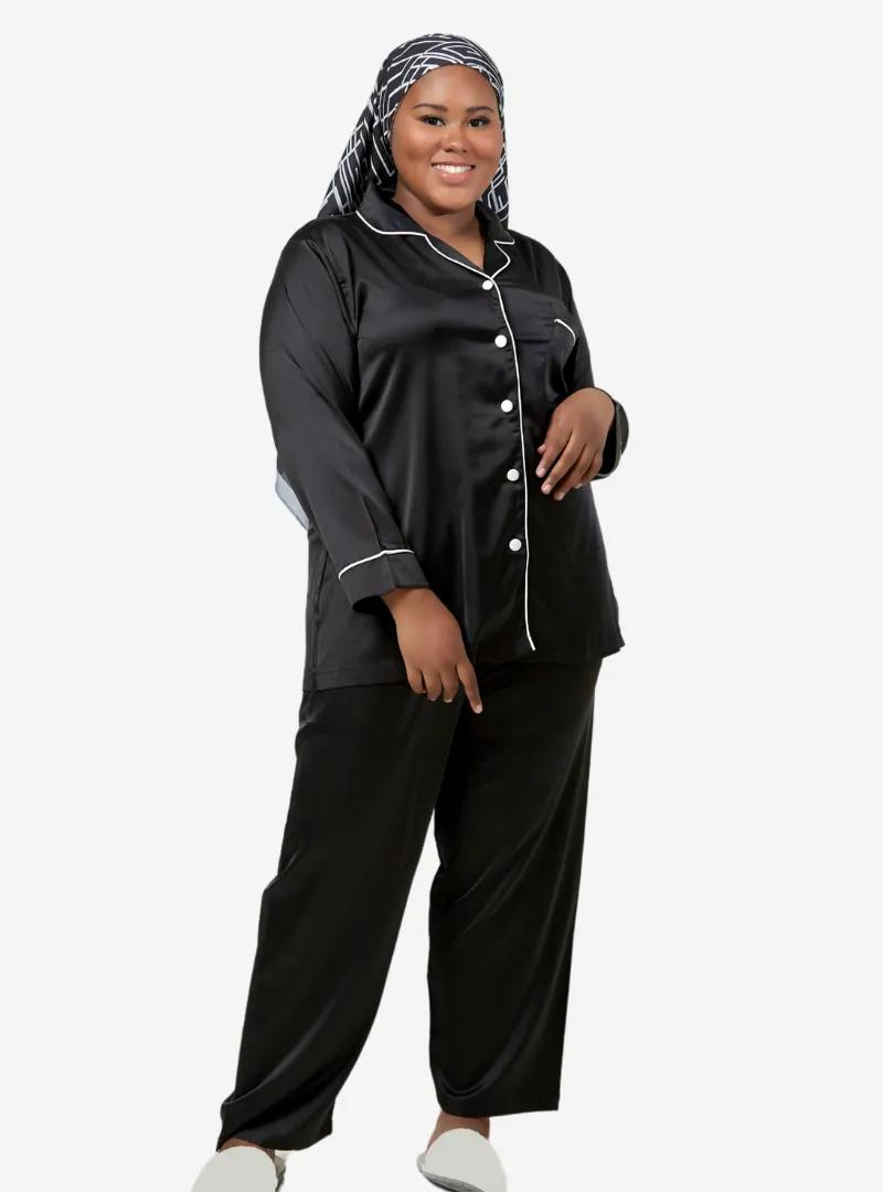 A woman dressed in Black Premium Satin Pyjamas