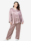 A woman dressed in Dusty Lilac Premium Satin Pyjamas