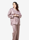 A woman dressed in Dusty Lilac Premium Satin Pyjamas