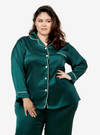 A woman dressed in Emerald Green Premium Satin Pyjamas